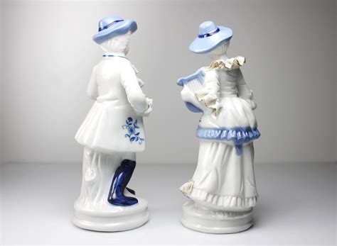 white and blue porcelain figurines|blue and white colonial figurines.